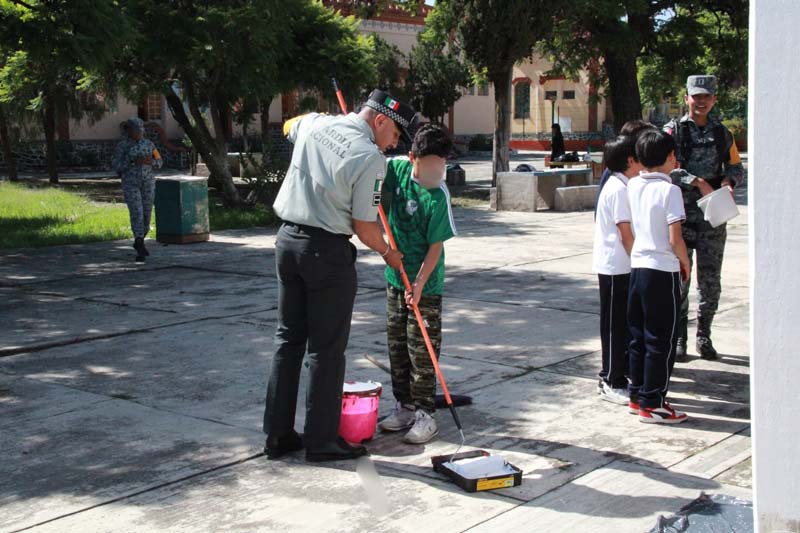 Guardia Nacional refuerza la seguridad en escuelas de Puebla con jornada de labor social