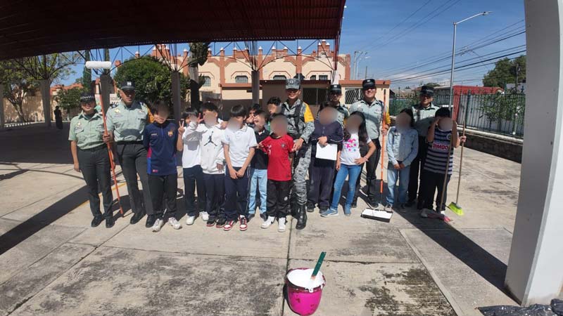 Guardia Nacional refuerza la seguridad en escuelas de Puebla con jornada de labor social