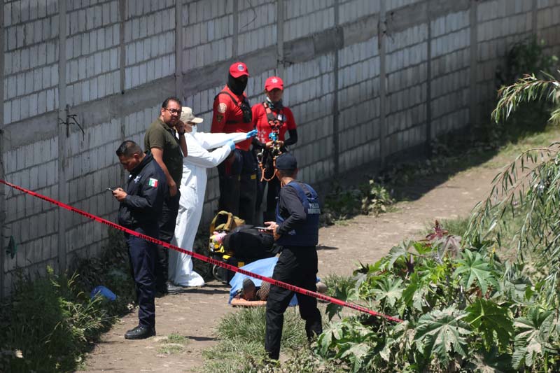 Localizan el cuerpo del policía arrastrado por la corriente en Ocoyucan