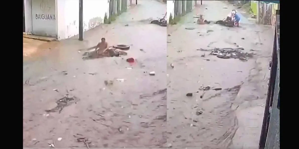 Indigente navega tranquilamente en calles de Campeche tras fuerte lluvia