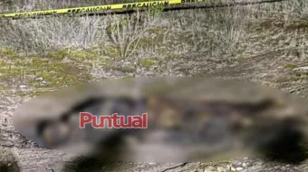 Hallan cuerpo calcinado y maniatado en Coyotepec, San Juan Atenco